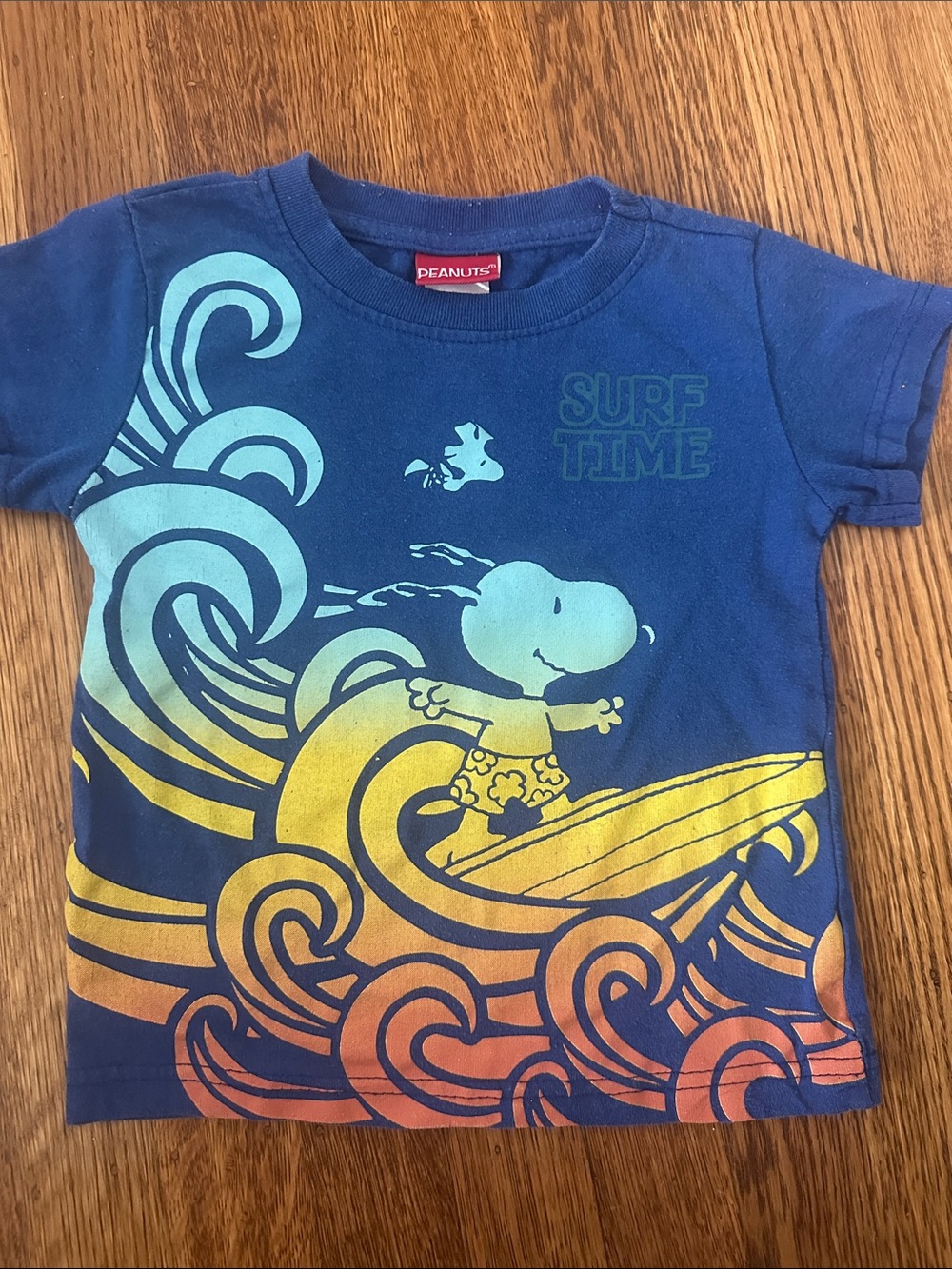 Peanuts Blue Kids Surf Snoopy Graphic Tee with Yellow & Teal Waves